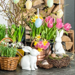 Easter display - flowers and bunnies.   Easter symbolizes the renewal of life and this would look lovely for this special time of the year.